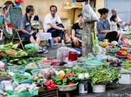 Roadside artisans, shops and taverns in Hanoi, Vietnam