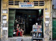 Roadside artisans, shops and taverns in Hanoi, Vietnam