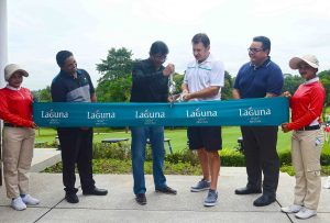 SPH's S. Murali (left) cuts the ribbon with Ravi Chandran, Sir Nick Faldo and Laguna Banyan General Manager Alpha Eldiansyah.