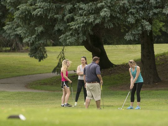 Golfers enjoy a round of golf at Hilltop Golf Course in Plymouth Township.