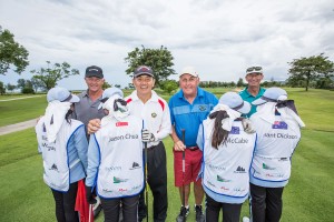 Centara World Masters Participants and their caddies wearing customized caddie bibs.